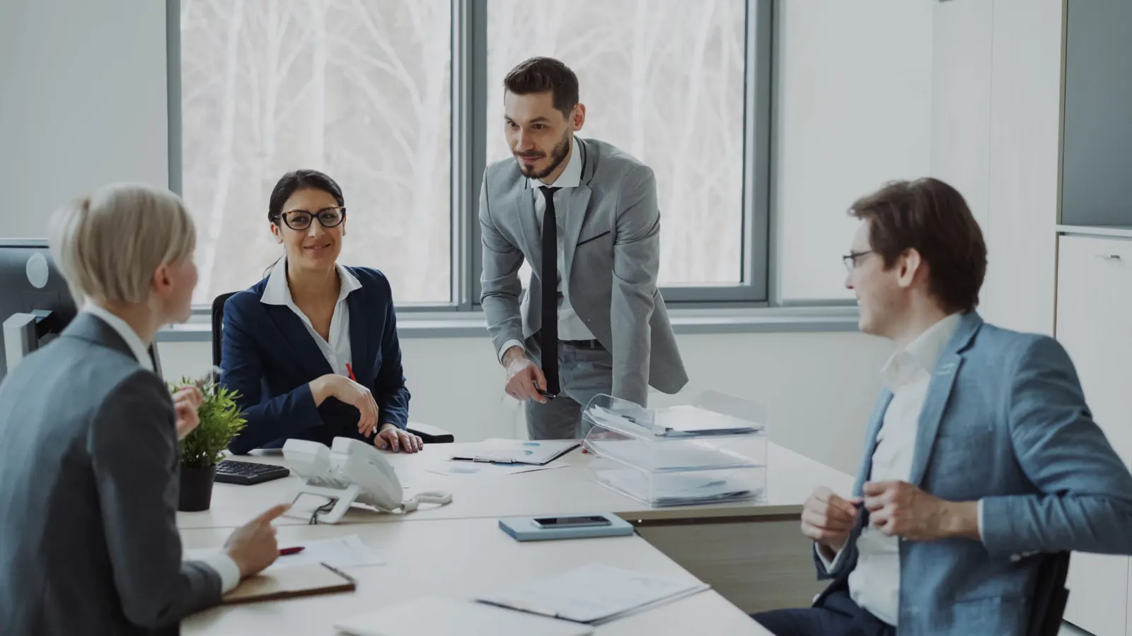 A hiring team meeting to align on a senior sales search