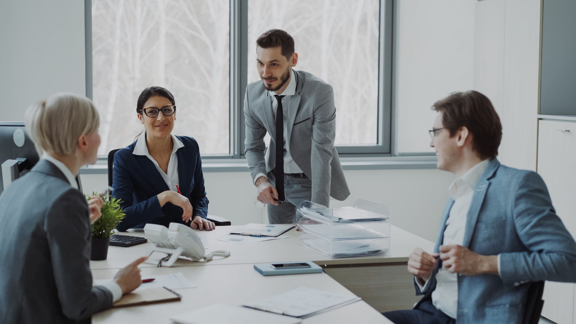 A hiring team meeting to align on a senior sales search