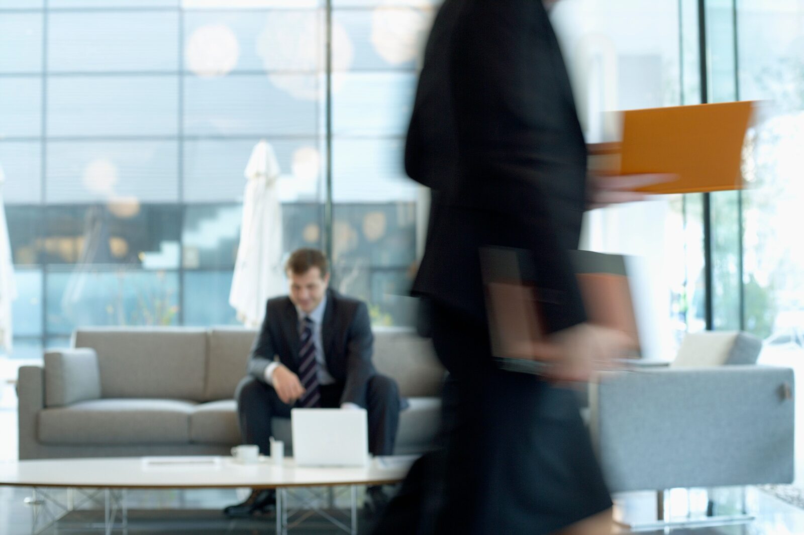 A candidate walking through a modern AI company office after a final-round interview